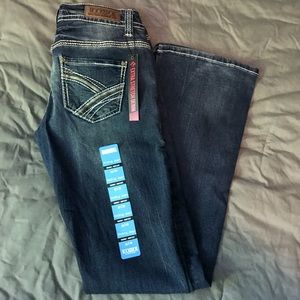 28x36” rock and roll cowgirl riding jeans